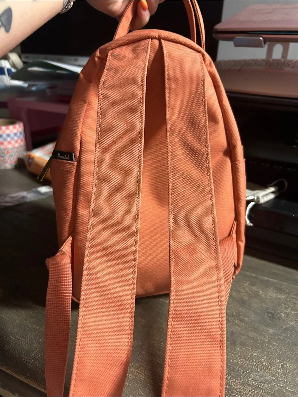 This coral-pink Herschel Nova Mini Backpack